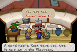 Mario receiveing Silver Credit from Koopa Koot in Koopa Village of Paper Mario.