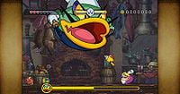 A screenshot of Wario fighting Large Fry.