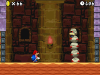 Screenshot of New Super Mario Bros. where Mario meets Mummipokey of World 2.