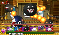 Screenshot of Chain Chomp & Flame Chomps as the alternative boss of World 5-Airship, from Puzzle & Dragons: Super Mario Bros. Edition.