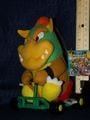 A plushie of Bowser from Super Mario Kart