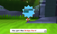Mario getting a Bridge Part scrap after defeating a Spear Guy in Shy Guy Jungle of Paper Mario: Sticker Star.