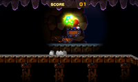 Screenshot of the Mysterious Mine Carts minigame in Mario & Luigi: Superstar Saga + Bowser's Minions