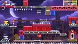 Screenshot of Twilight City level 8-5 from the Nintendo Switch version of Mario vs. Donkey Kong