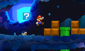 Mario battling some enemies in a beta underground area.