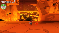 Mario standing near a Healing Heart in Fire Vellumental Cave of The Origami King.
