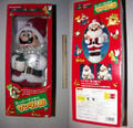 A Mario figurine in Santa Claus' clothes and beard, produced for the holidays
