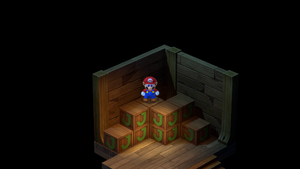 Mario finding a Flower behind crates in the first stair room of Sunken Ship of Super Mario RPG.