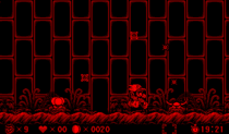 Screenshot of Wario with two Pollen Plants, from Virtual Boy Wario Land.