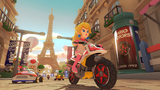 Princess Peach, Toad, Yoshi and Shy Guy racing on Tour Paris Promenade