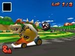 Bowser races on the racetrack in an early build