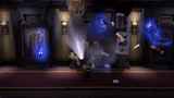 Three blue ghosts scaring Luigi in the hallway after popping out of a janitor's cart, there two suite numbers consisting of "506" and "507", along with a wanted poster partially of Luigi's face with a G bag for a ransom