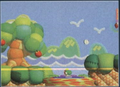Green Yoshi standing on a Neuron in a beach or grass level, in which they do not appear in the final.