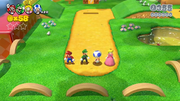 All four characters standing idle in a grassland level.