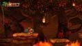 Two fireballs raining down in front of Donkey Kong in Donkey Kong Country: Tropical Freeze