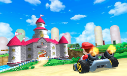Mario races to Peach's Castle in Mario Circuit from an E3 2010 build of Mario Kart 7.