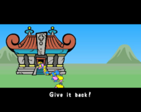 Wario being chased into the Temple of Form