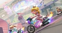 Princess Peach driving in her racer suit in Peach Stadium, from Mario Kart World