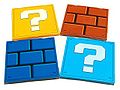 Super Mario-themed cases that can hold CDs. Comes with four different cases: ? Block (yellow and blue), and Brick Block (brown and blue)[5]