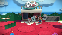 Mario being given an Ice Flower Battle Card by a Toad in Ruddy Road of Paper Mario: Color Splash.