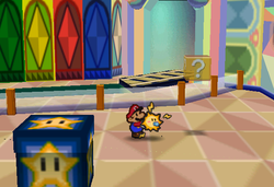 Image of Mario revealing a hidden ? Block in Shy Guy's Toy Box, in Paper Mario.