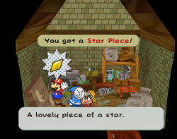 Screenshot of Mario getting a Star Piece inside the house in the back alley in Rogueport, in Paper Mario: The Thousand-Year Door.