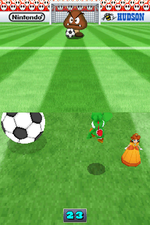 Yoshi and Princess Daisy in a duel match of Soccer Survival mini-game in Mario Party DS.