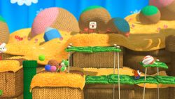 Screenshot of Yarn Yoshi Takes Shape!, from Yoshi's Woolly World.