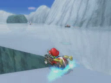 Baby Mario drifting on N64 Sherbet Land