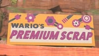 Wario's Premium Scraps advert in Mario Kart World