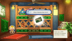 Mario being given the Silver Membership Card by the item shop shopkeeper in Shroom City of The Origami King.