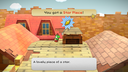 Mario getting the Star Piece behind the chimney of Bobbery's house in east Rogueport in the remake of the Paper Mario: The Thousand-Year Door for the Nintendo Switch.