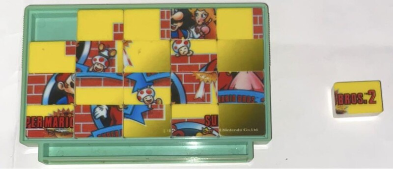File:SMB2 pocket puzzle open case.jpg