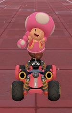 Toadette performing a trick.