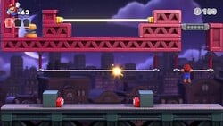 Screenshot of Twilight City level 8-3 from the Nintendo Switch version of Mario vs. Donkey Kong