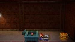 Mario near a Dried Mushroom in Riverside Station of Paper Mario: The Thousand-Year Door for Nintendo Switch.