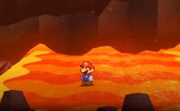 Mario walking across lava in Rugged Road.
