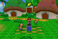 Mario finding a Star Piece on the brick block in Koopa Village in Paper Mario