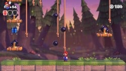 Screenshot of Mystic Forest level 7-4 from the Nintendo Switch version of Mario vs. Donkey Kong
