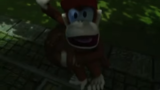 Diddy Kong panicking as he almost gets run over by a large barrel.