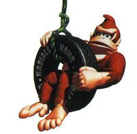 Artwork of Donkey Kong in a tire from Donkey Kong Country