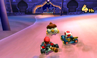 Mario, Donkey Kong, and Toad racing in Shy Guy Bazaar in Mario Kart 7