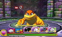 Screenshot of a boss battle with Boom Boom, from Puzzle & Dragons: Super Mario Bros. Edition.