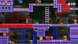 Screenshot of Mario Toy Factory level 1-1+ from the Nintendo Switch version of Mario vs. Donkey Kong