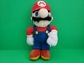 A plushie of Mario by Play By Play