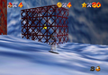 Vanish Metal Mario standing by wire nets in Dire, Dire Docks in Super Mario 64