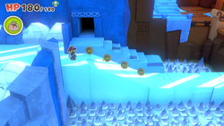 Mario standing near 4 10-Coins in Sea Tower of The Origami King.
