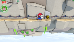 Mario standing near a Coin in Spring of Rainbows of The Origami King.