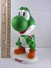 A figurine of Yoshi.