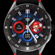 The tricolour watchface, featuring a traditional dark grey chronograph design with red and blue accents as well as Mario's Mario Party artwork on the right.